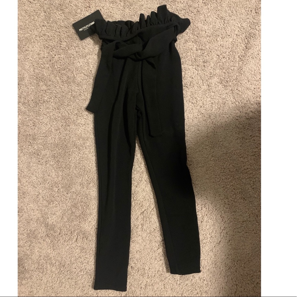 Black paperbag skinny trousers